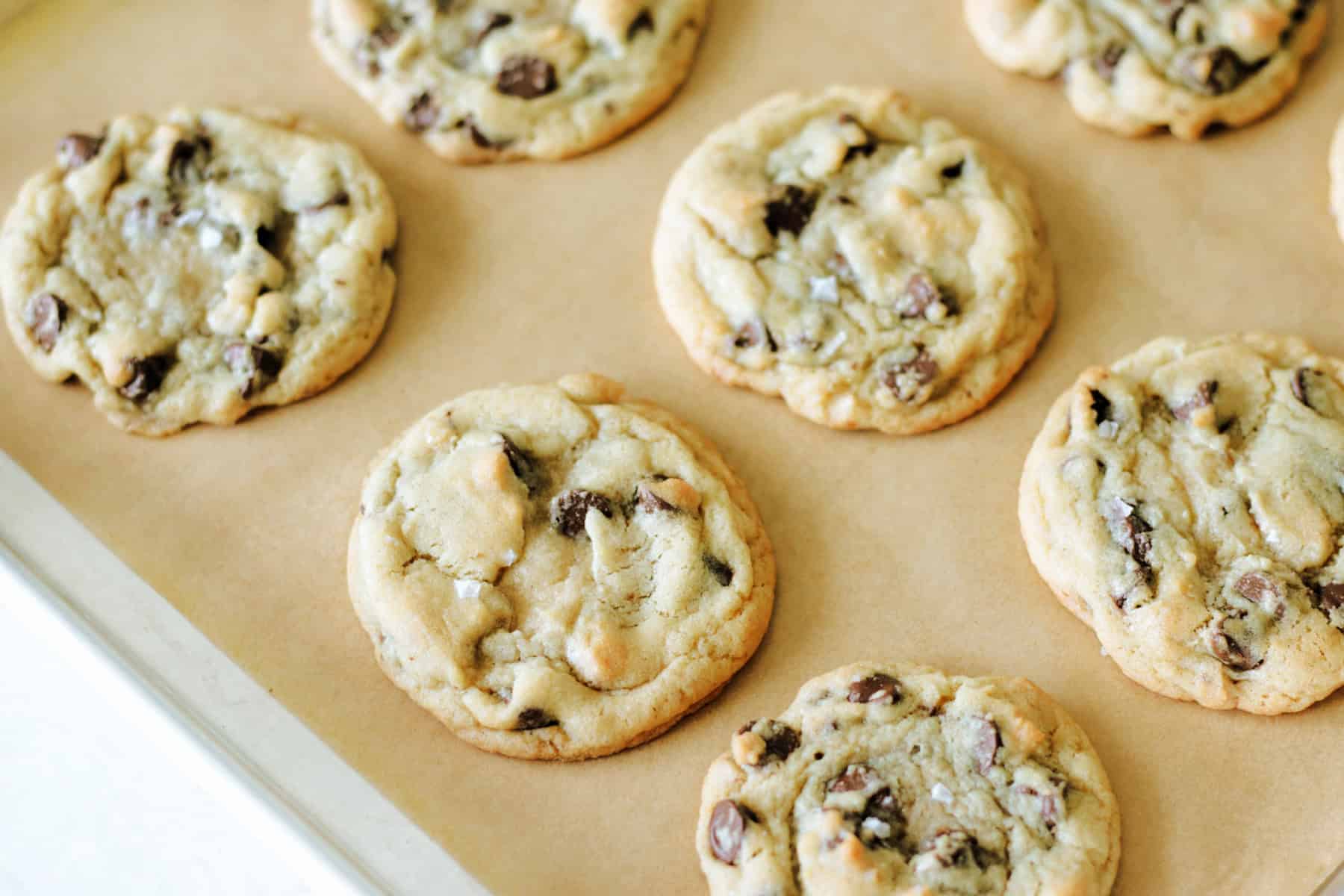 tray of baked cookies on parchment paper