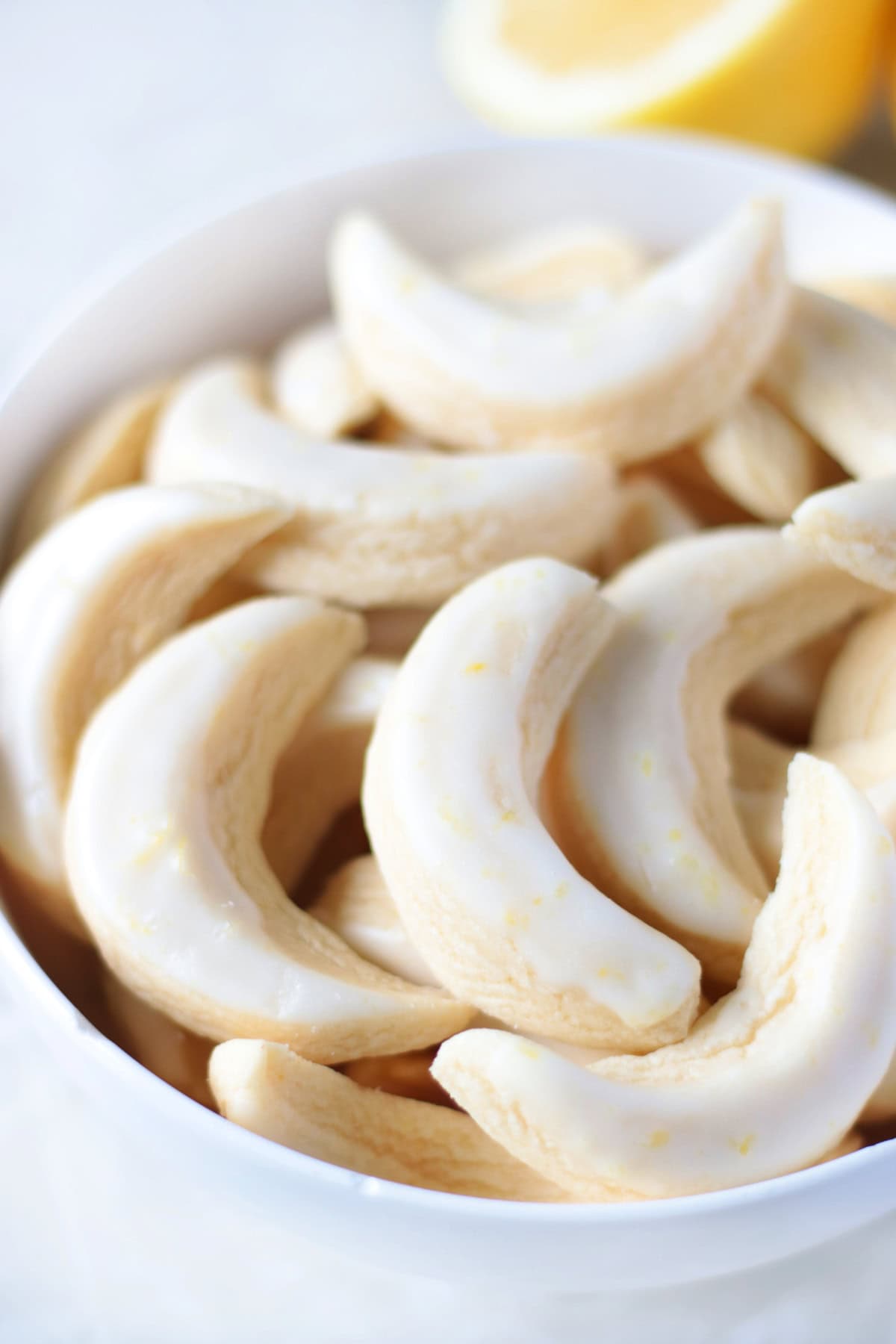 Copycat lemon cookies in a white bowl.