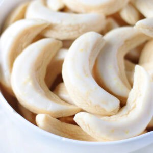 White bowl of lemon cookies.