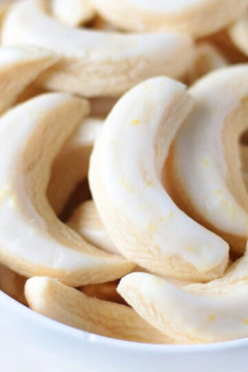 White bowl of lemon cookies.