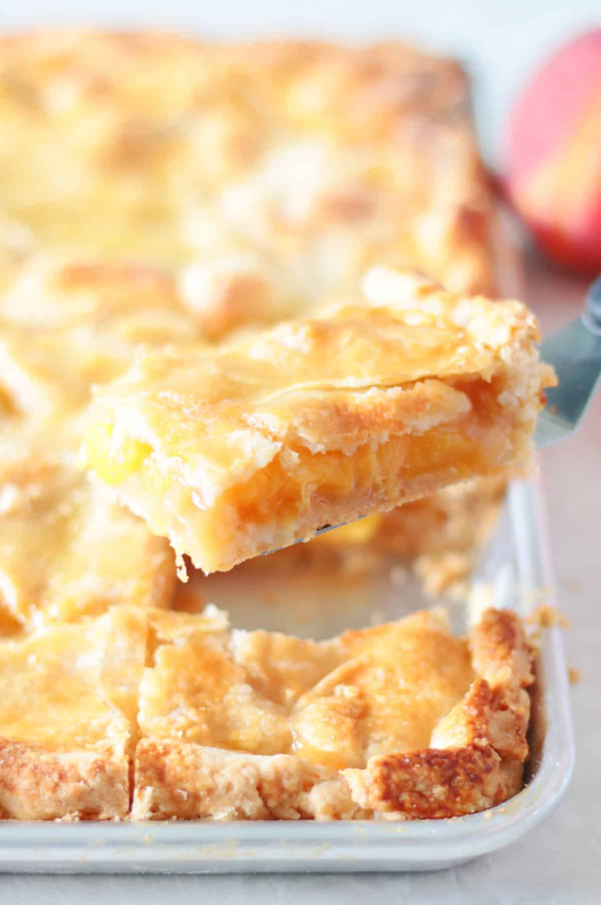 slice of peach pie of spatula
