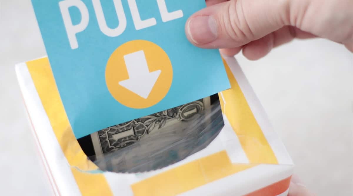 Tag that says "pull" coming out of a tissue box.
