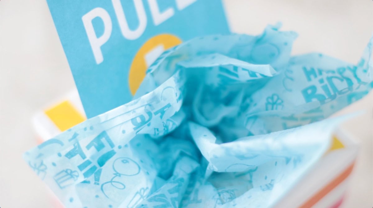 Blue tissue paper inserted in tissue box.