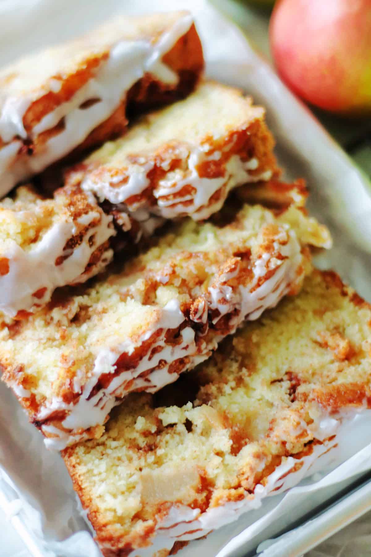4 slices of apple fritter bread on a platter.