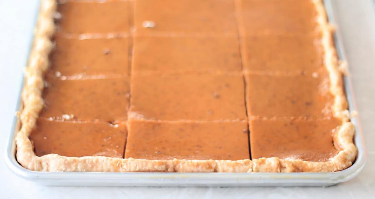 Sheet pan of baked pumpkin pie.