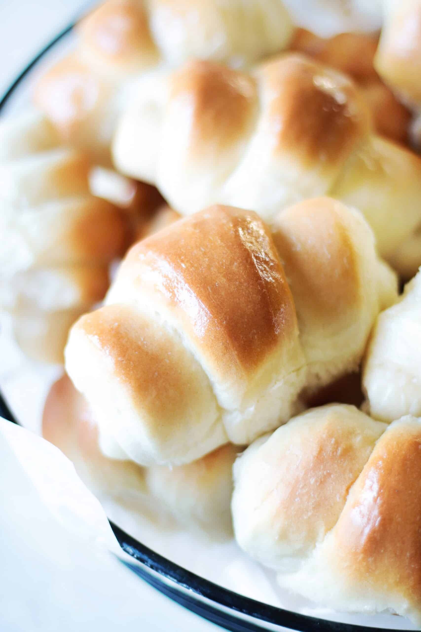 Crescent rolls in a wire basket.