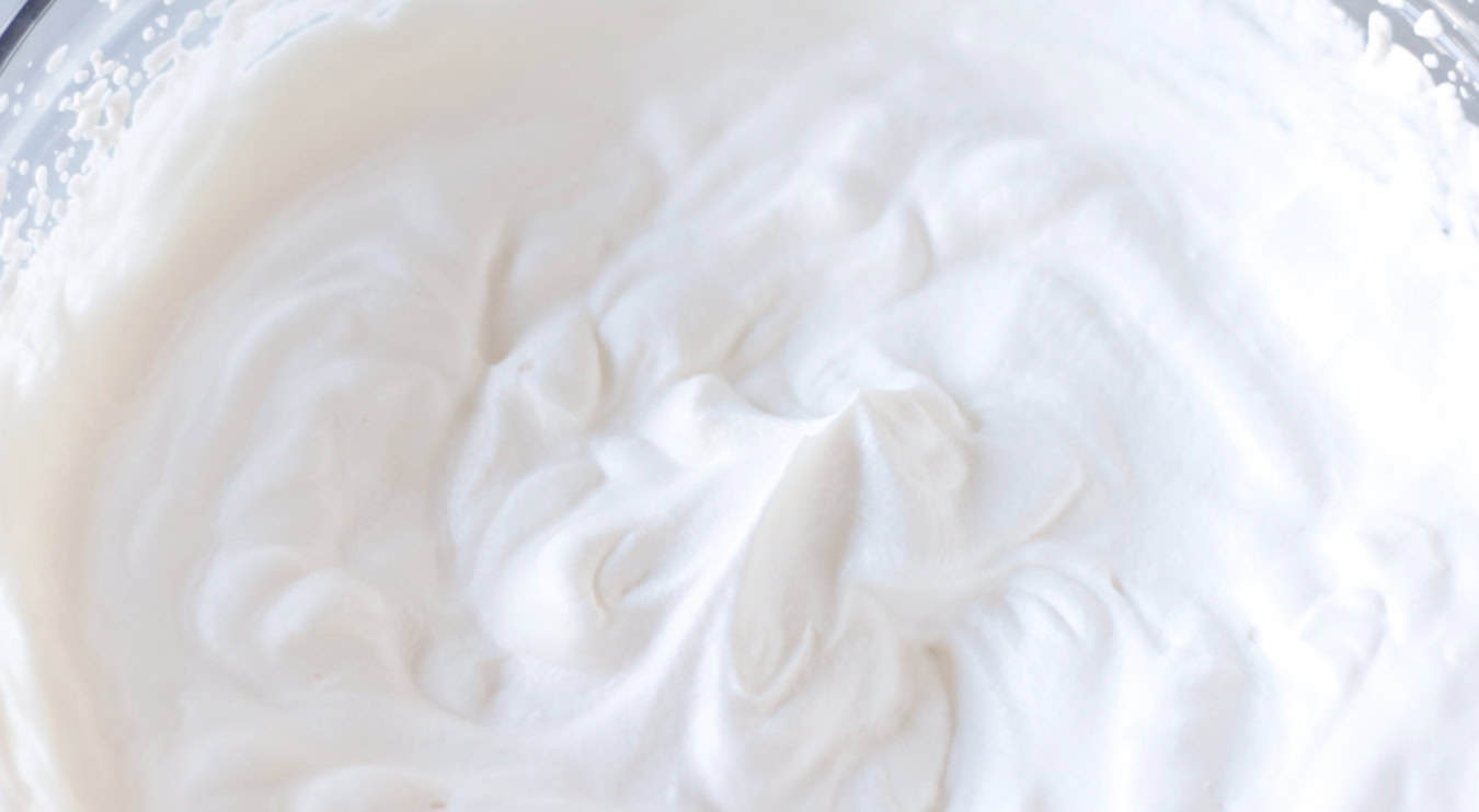 Large bowl of homemade whipped cream.