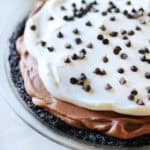 No bake chocolate silk pie in glass pie pan.