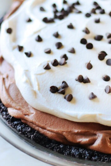 No bake chocolate silk pie in glass pie pan.