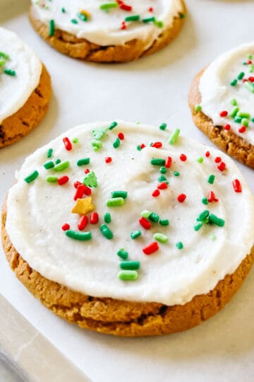 Buttercream frosted ginger cookies with sprinkles.