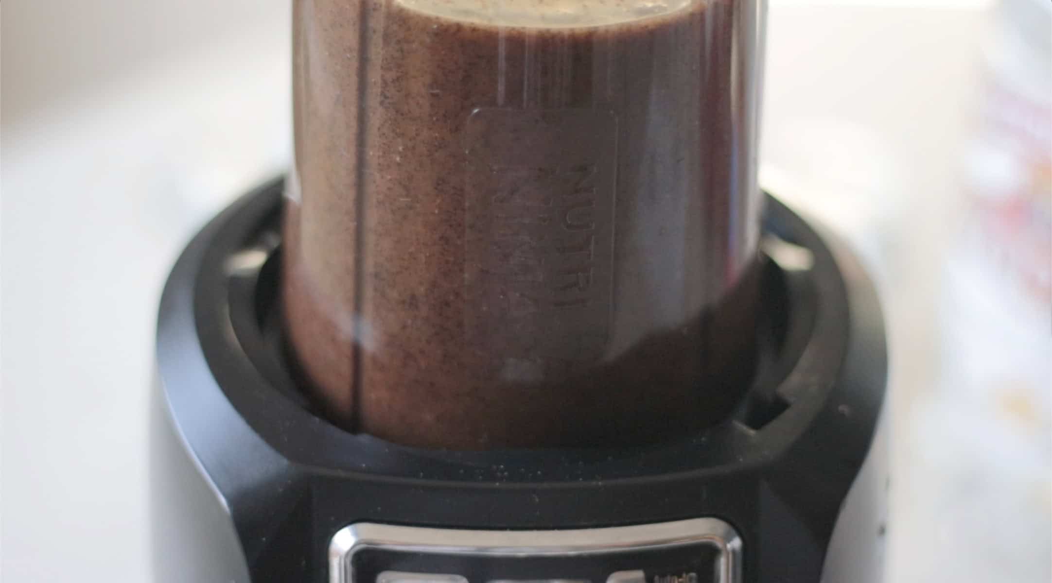 Blender with vanilla paste inside.