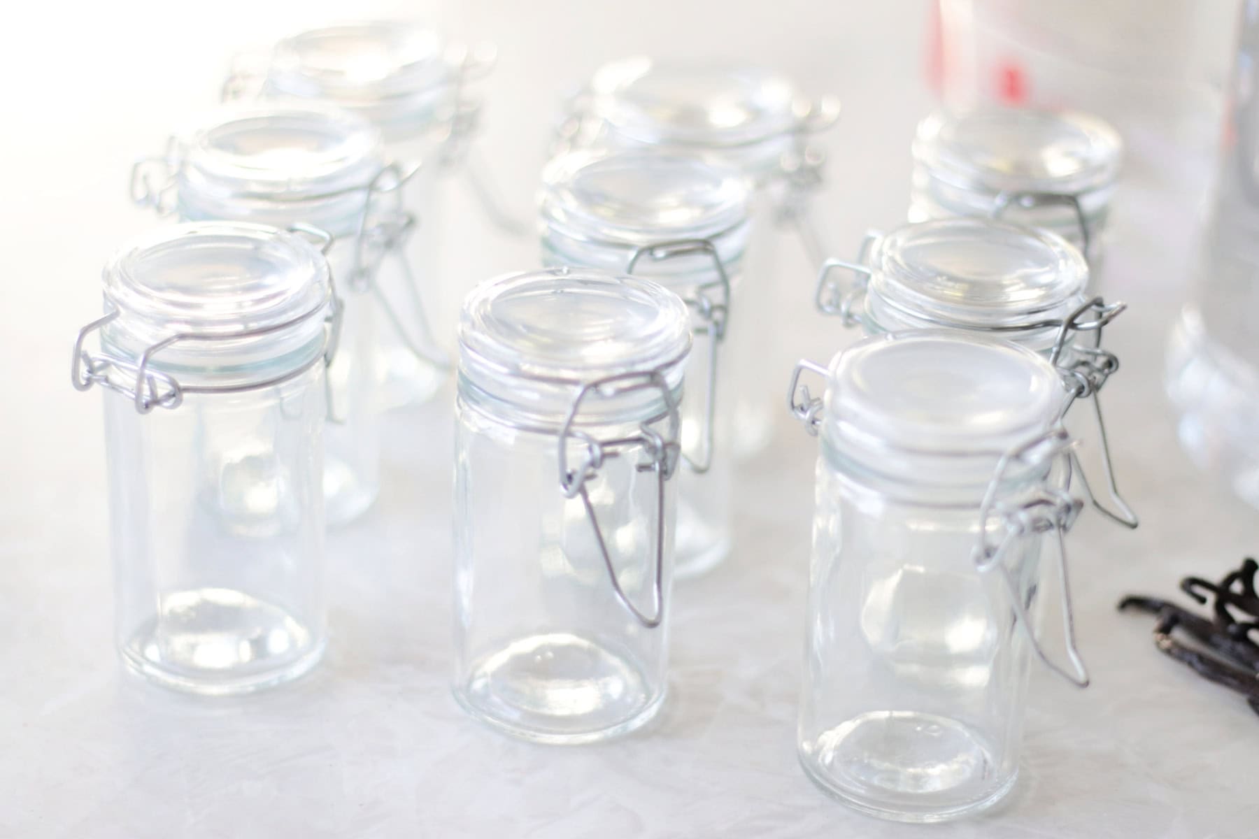 Small glass jars with lids.