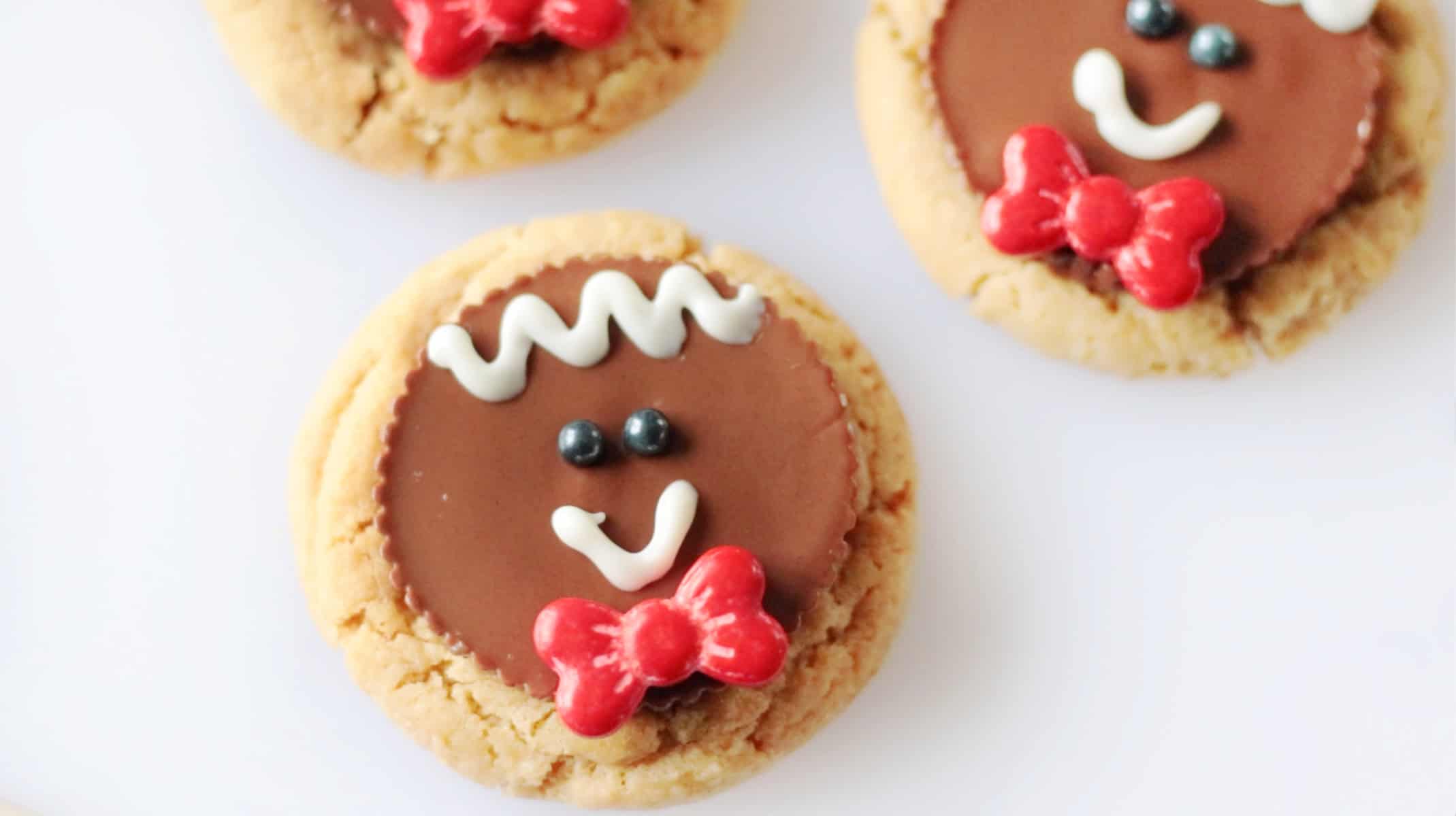 Gingerbread decorated peanut butter cup cookies.