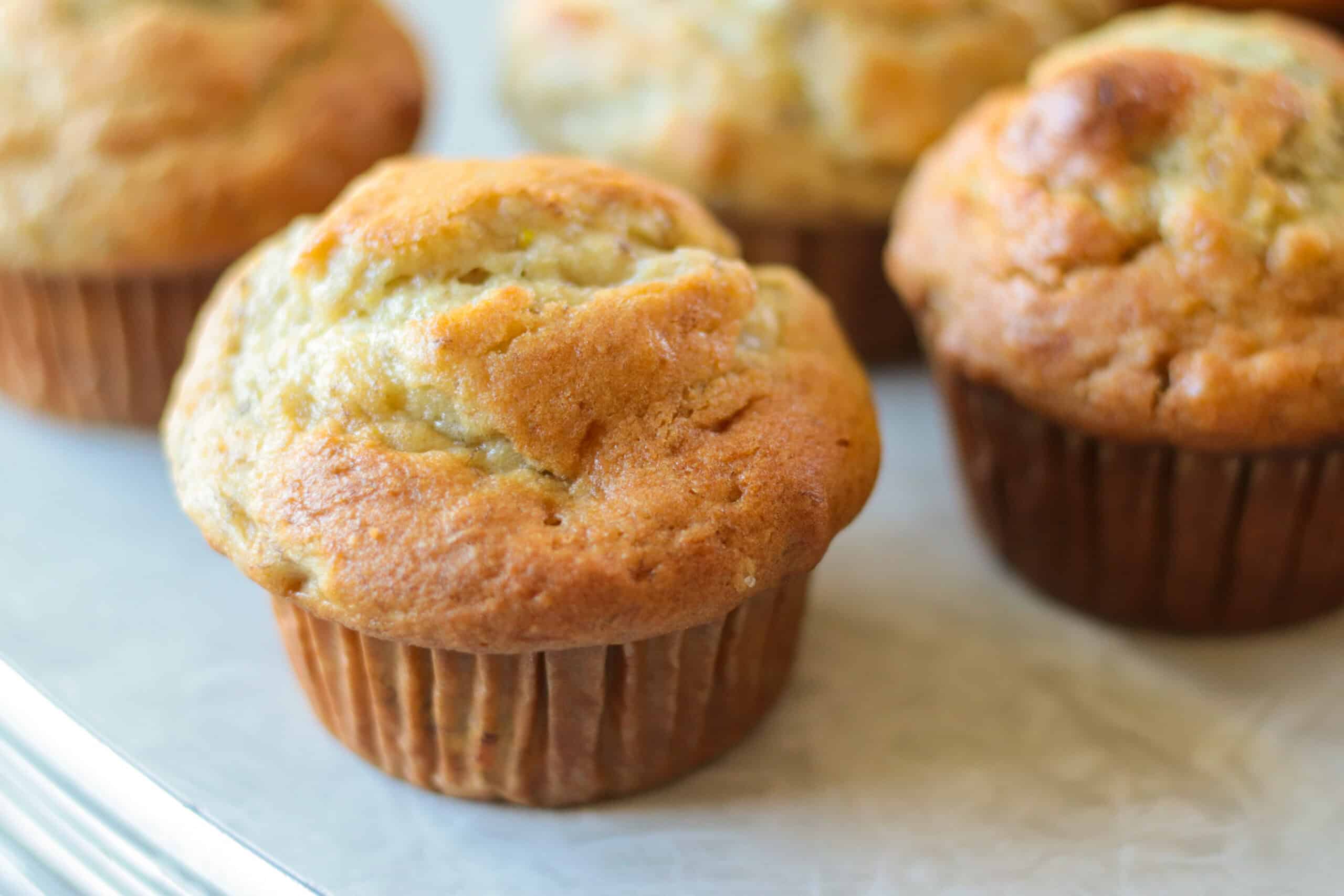 Banana nut muffins on a table.