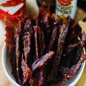 Jerky strips in a bowl.