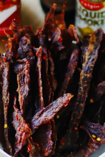 Jerky strips in a bowl.