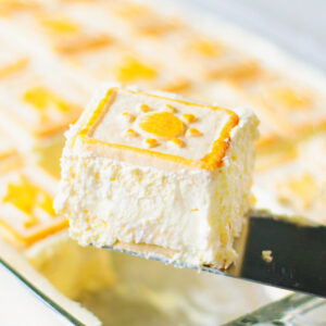 Slice of Chessmen banana pudding on a metal spatula.