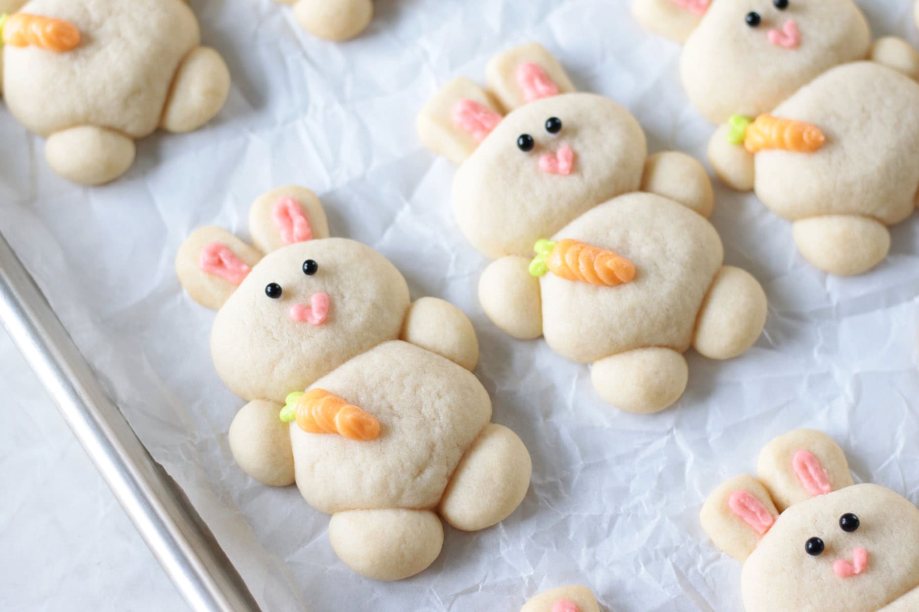 Bunny sugar cookies on a baking sheet.