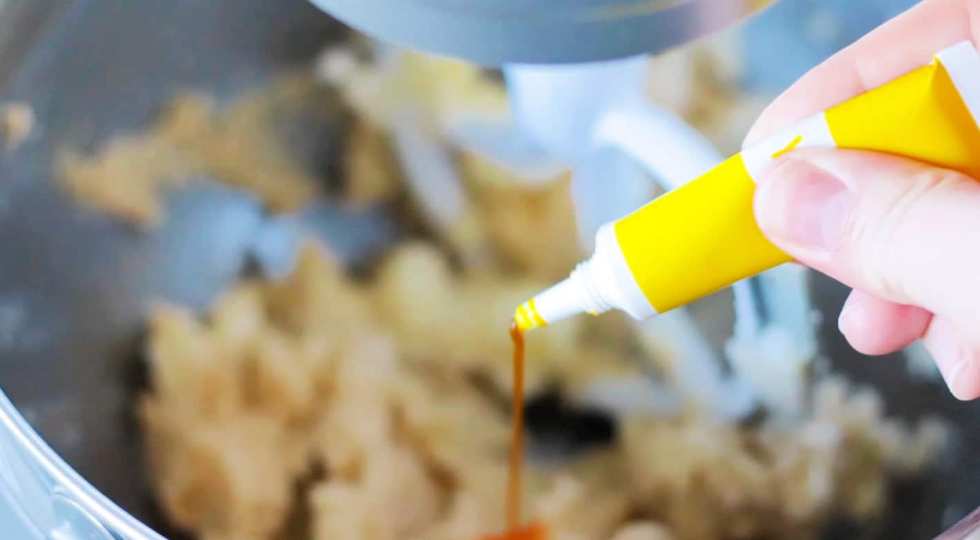 Yellow food coloring squeezed onto sugar cookie dough.