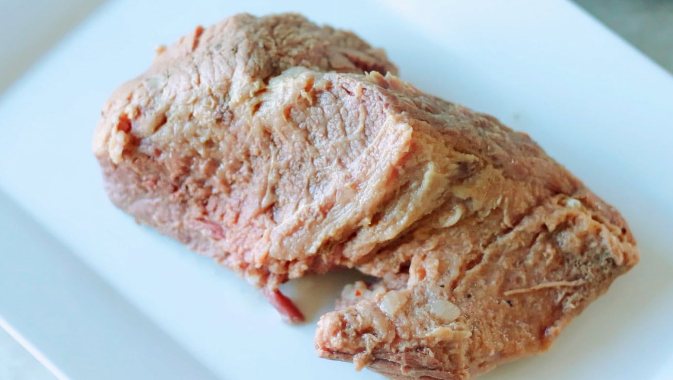 Corned beef brisket on platter.