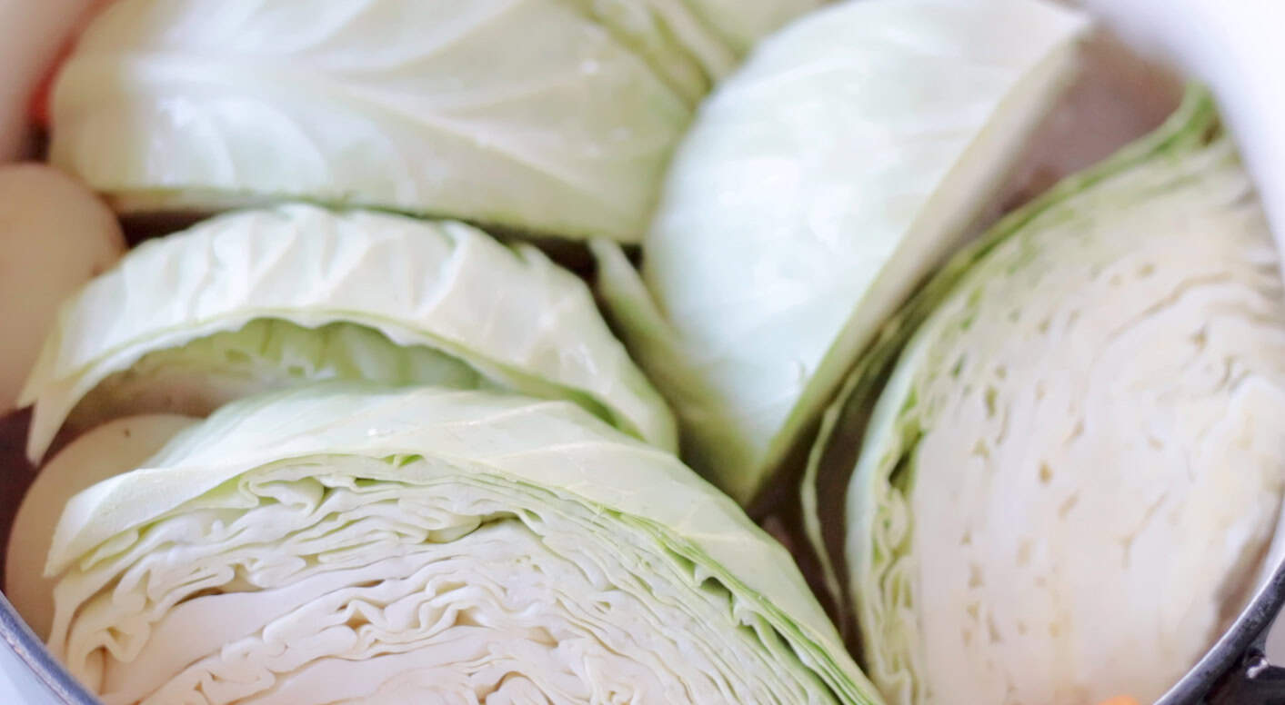 Raw cabbage in large pot.