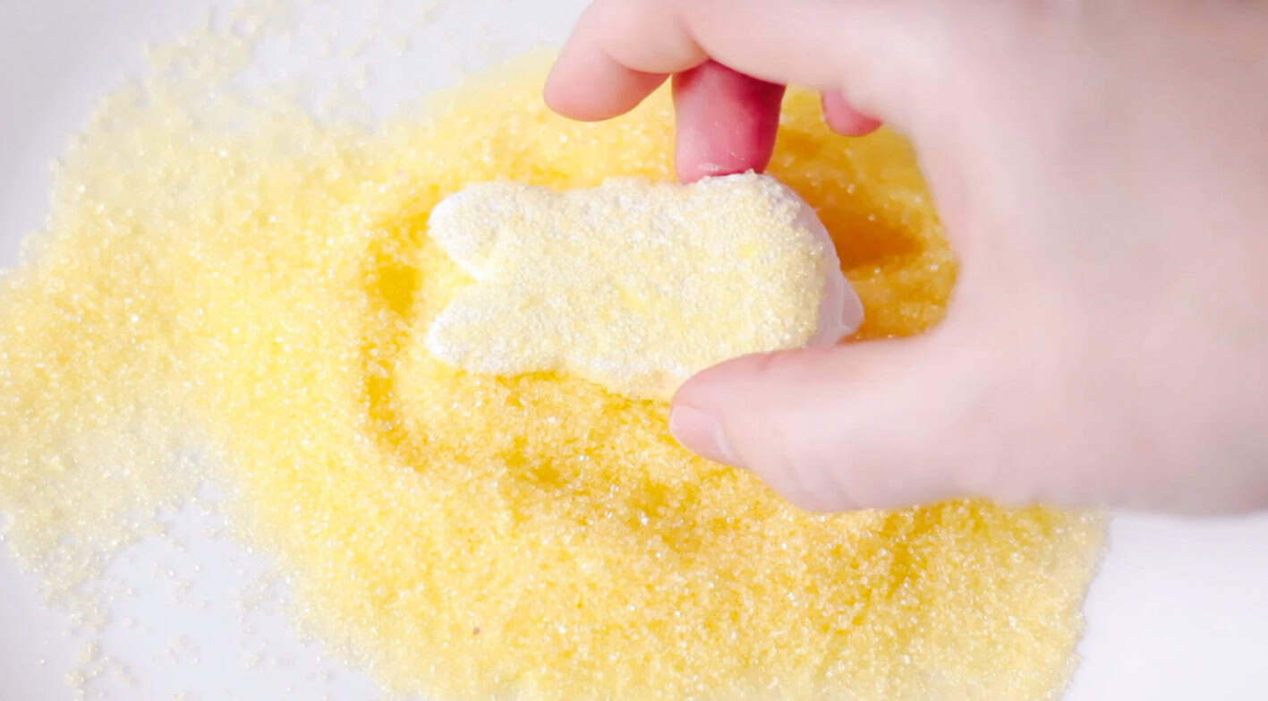 Bunny marshmallow tossed in yellow sanding sugar.