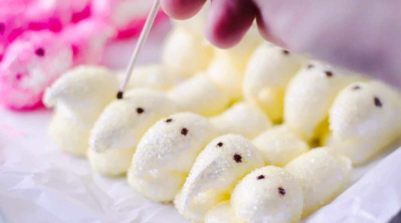 Toothpick dotting eyes onto each chick marshmalows.