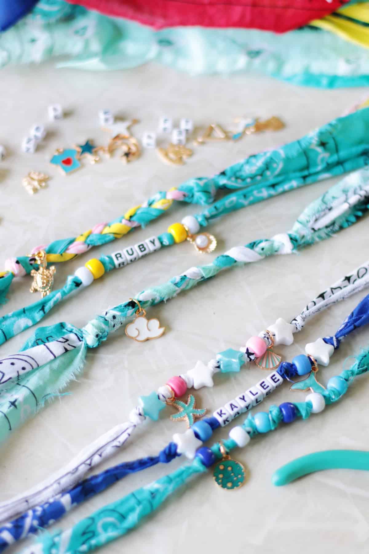 Bandana bracelets on table.