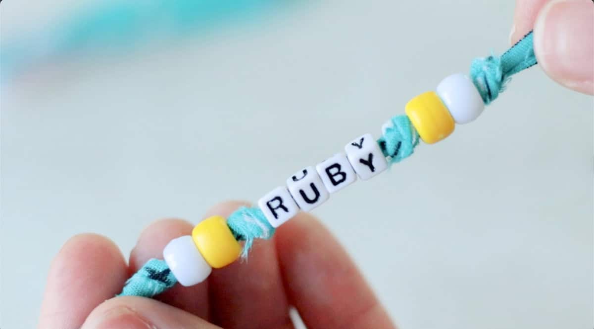 Beaded bracelet that spells RUBY.