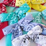 Stack of colorful bandana hair bows.