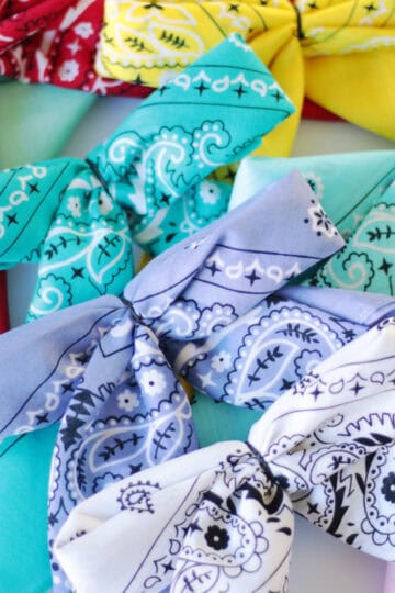 Stack of colorful bandana hair bows.