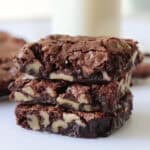 3 walnut brownies stacked.