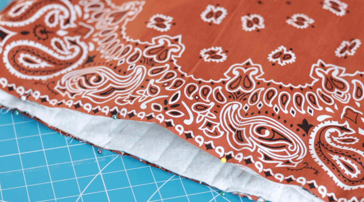 Layers of fabric pinned together.