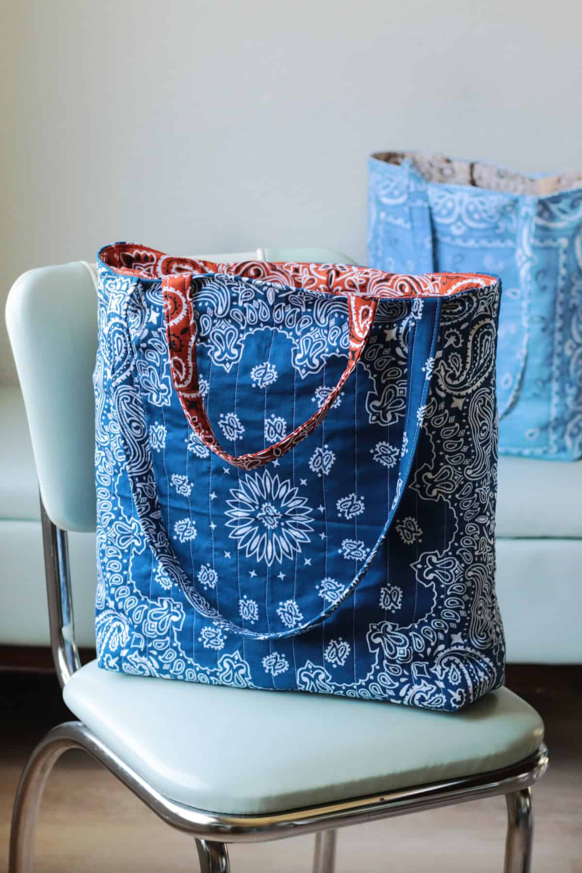 Blue bandana bag on chair.