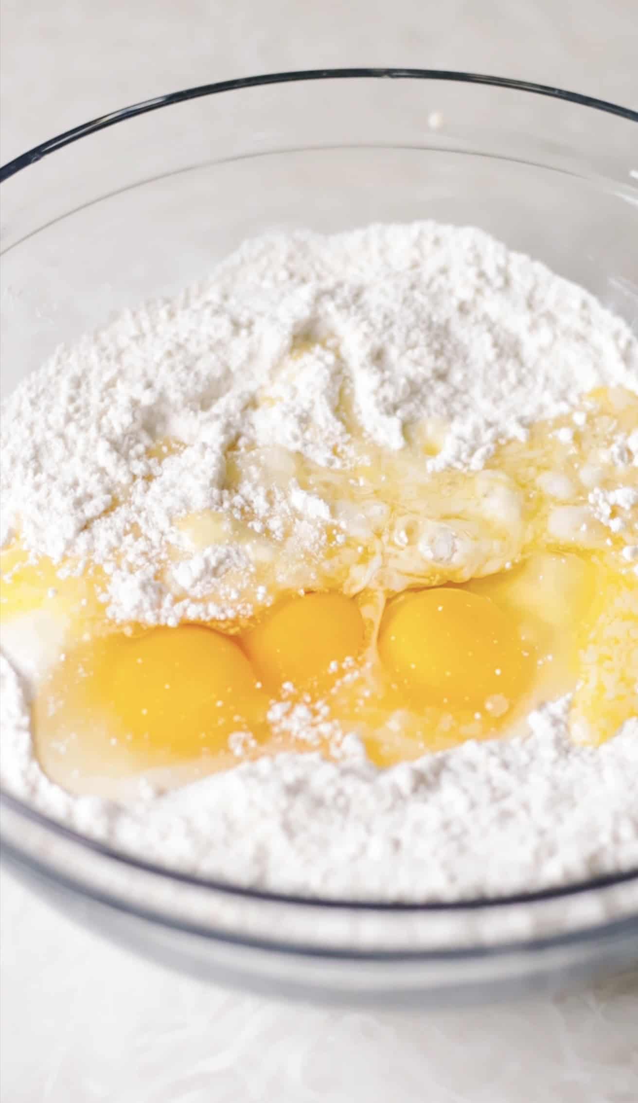 Bowl of cake mix, oil, and eggs.