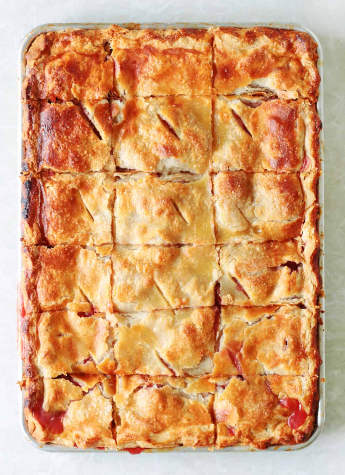 Slab pie sliced into 18 squares.