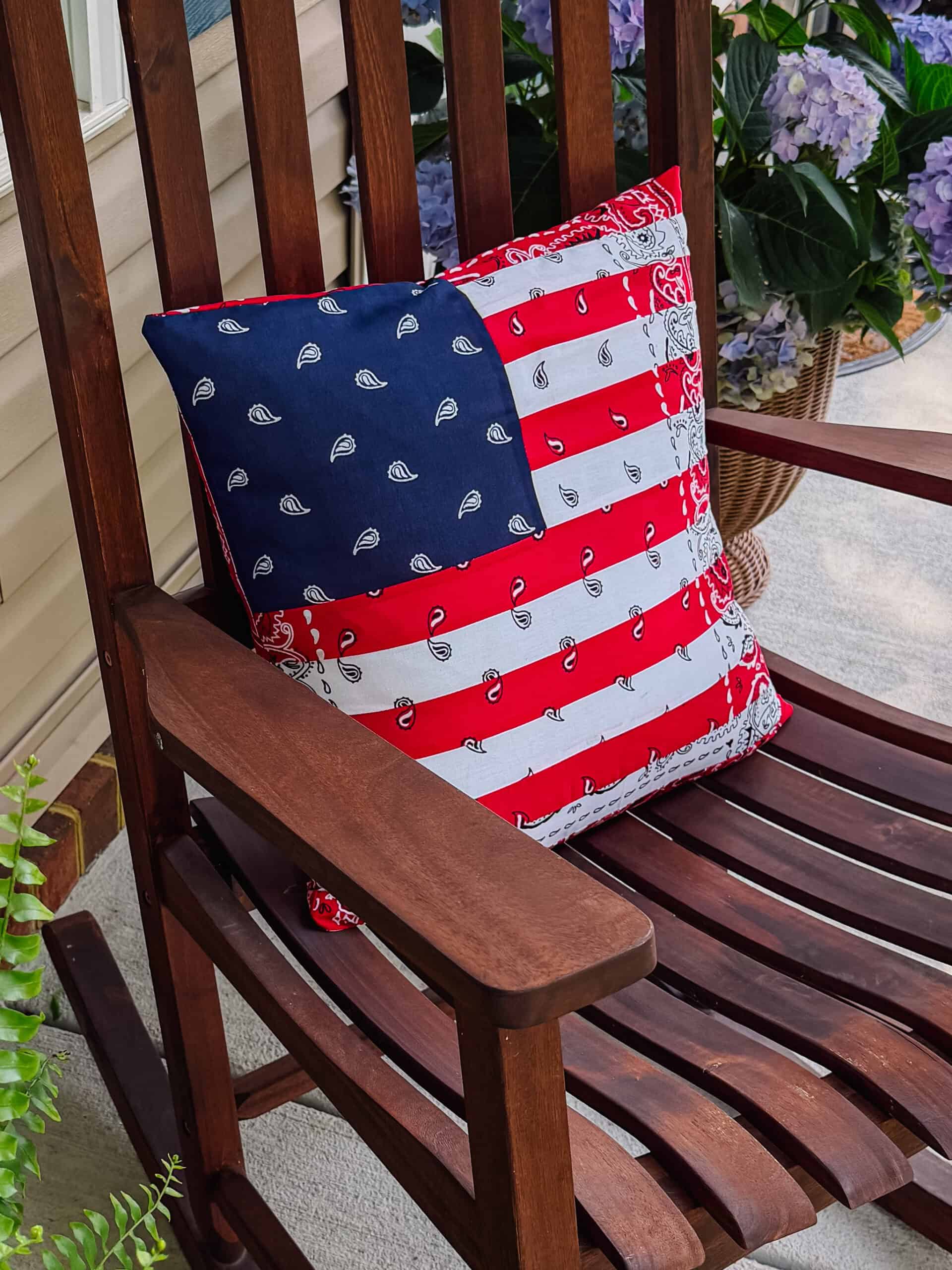 Pillow on rocking chair.