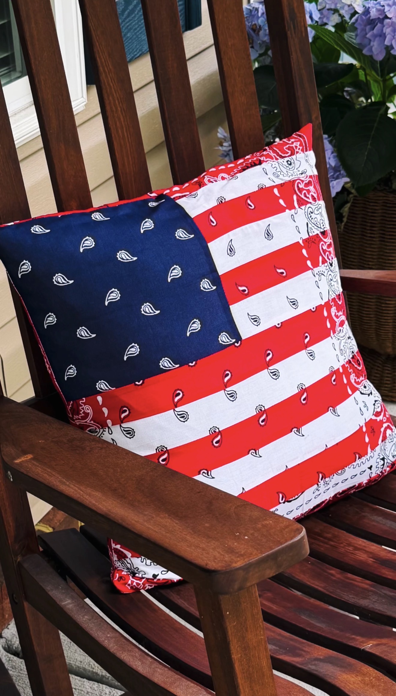 Pillow on rocking chair.