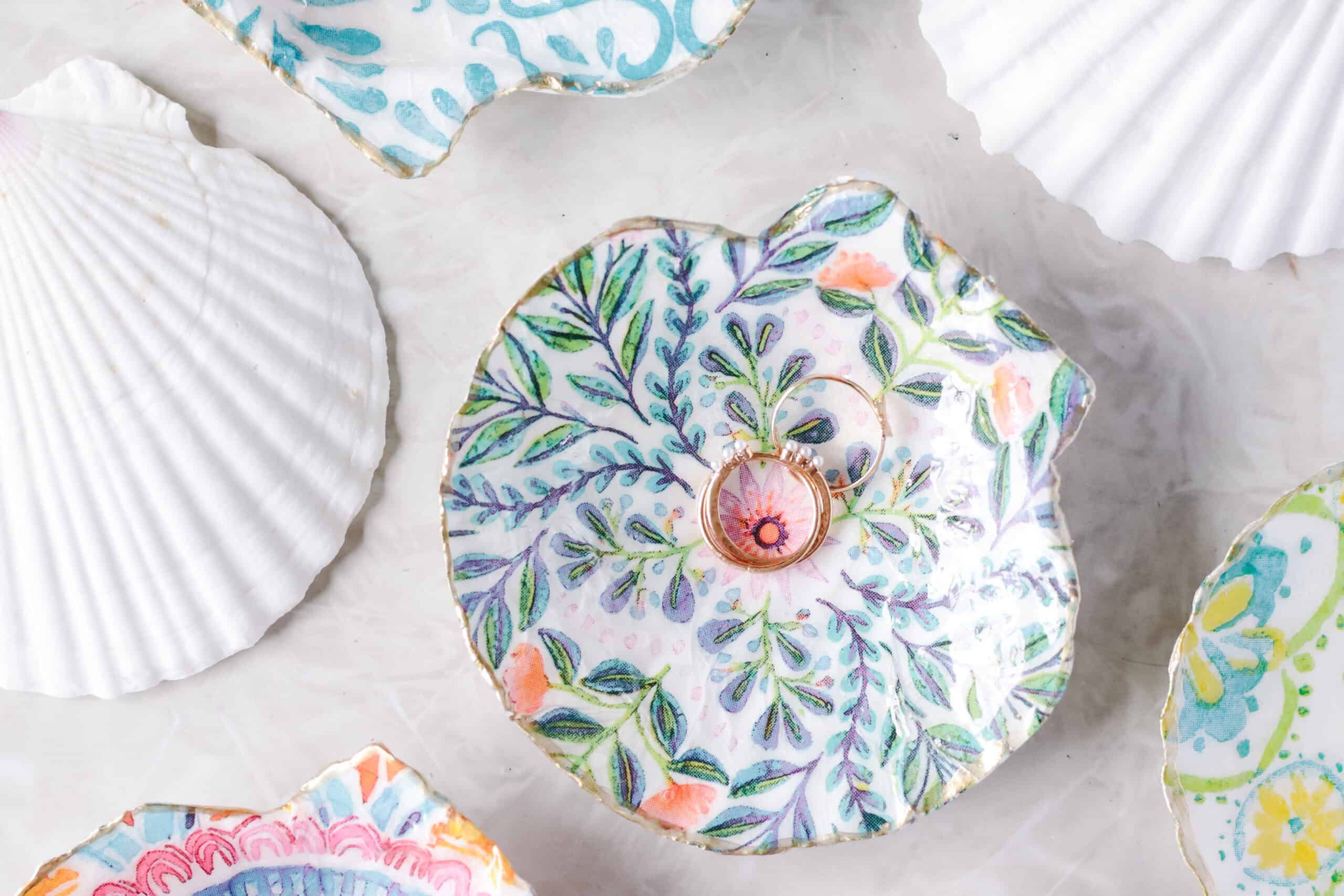 Decorated ring dishes with jewelry.