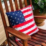 Bandana flag pillow on rocking chair.