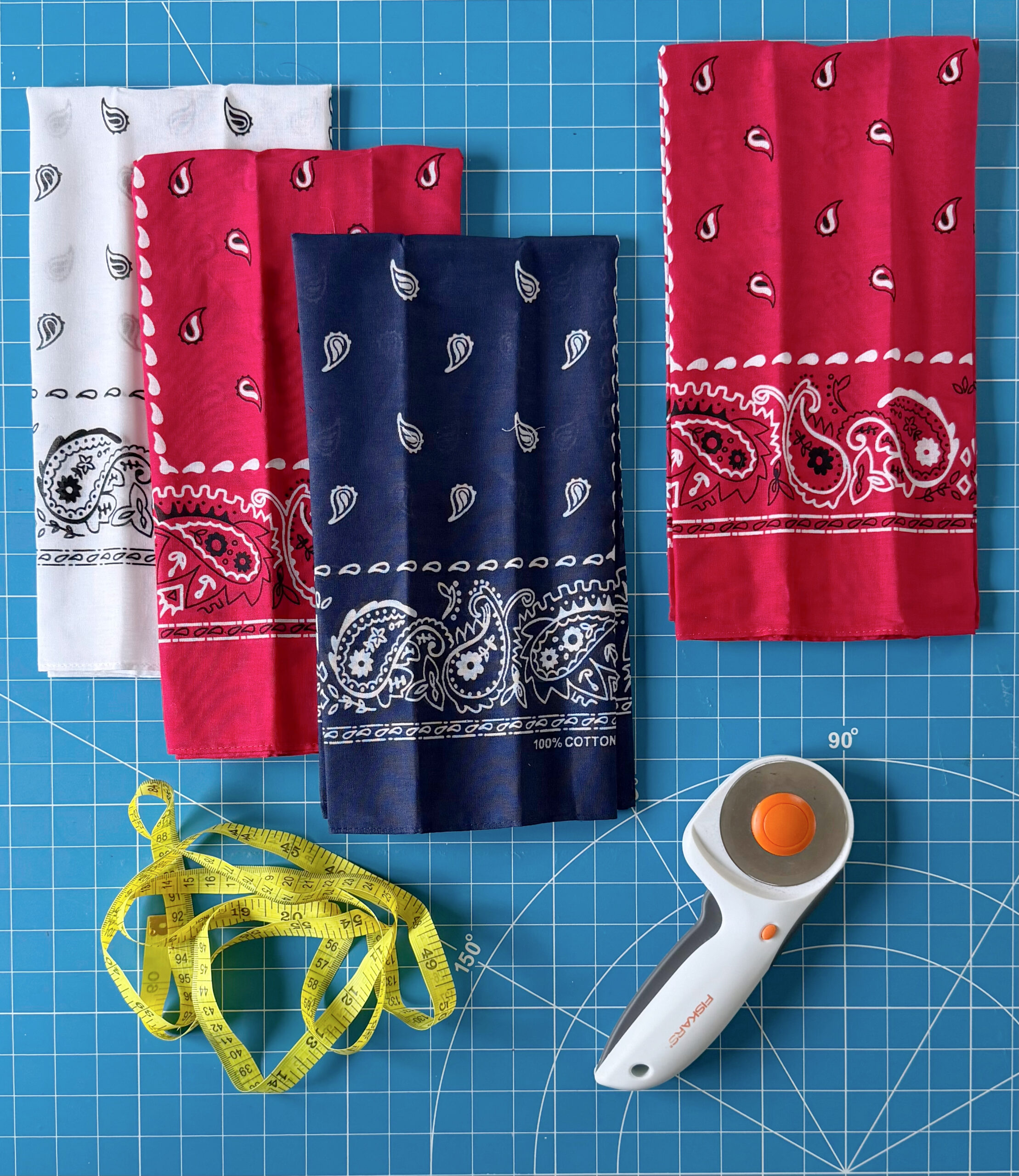 4 bandanas, measuring tape and rotary cutter.