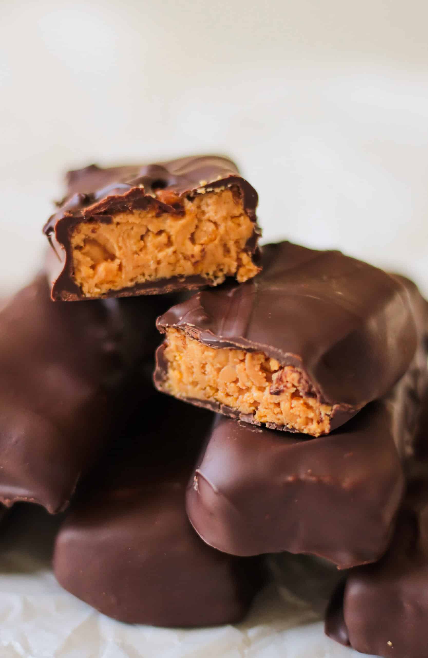 Homemade cornflake butterfinger bars stacked.