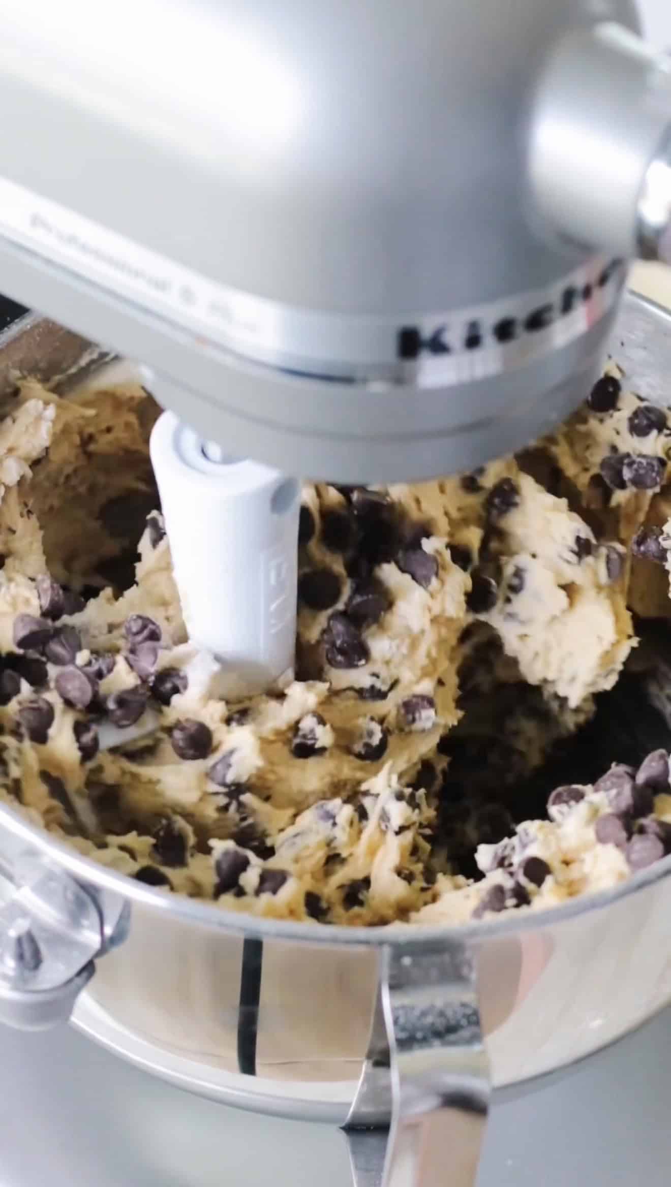 Stand mixer with chocolate chip cookie dough.