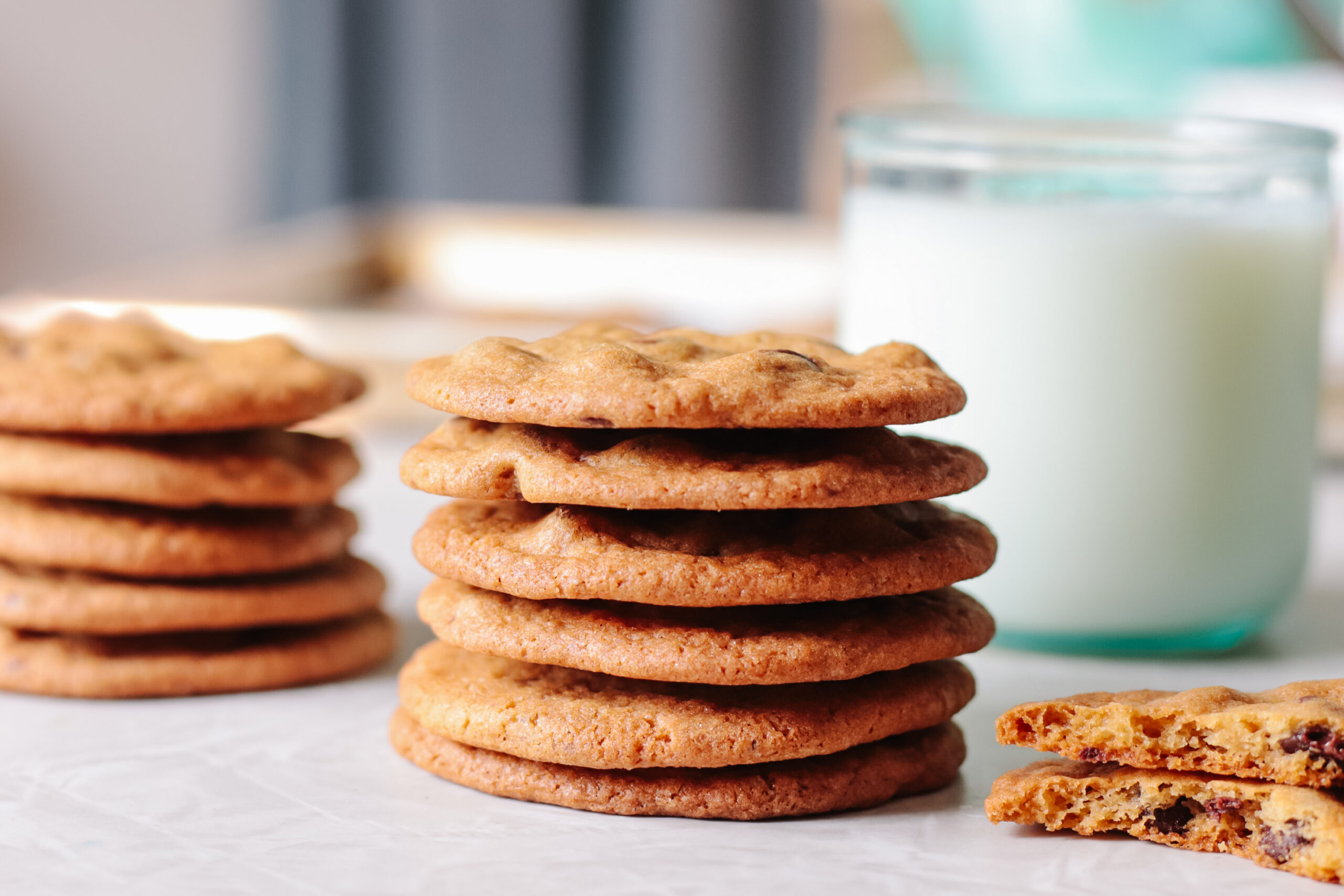 Stack of thin and crispy cookies on table.