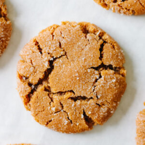 Disney molasses crackle cookies on parchment paper.