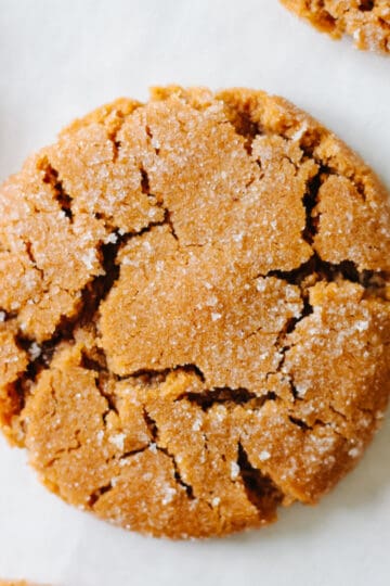 Disney molasses crackle cookies on parchment paper.