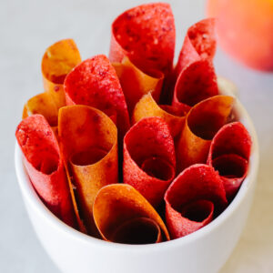 Cup of rolls of fruit leather.