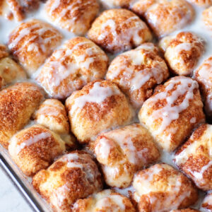 Baking dish of cinnamon roll bites.