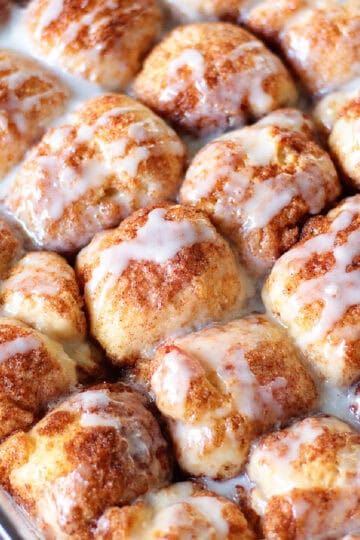 Baking dish of cinnamon roll bites.