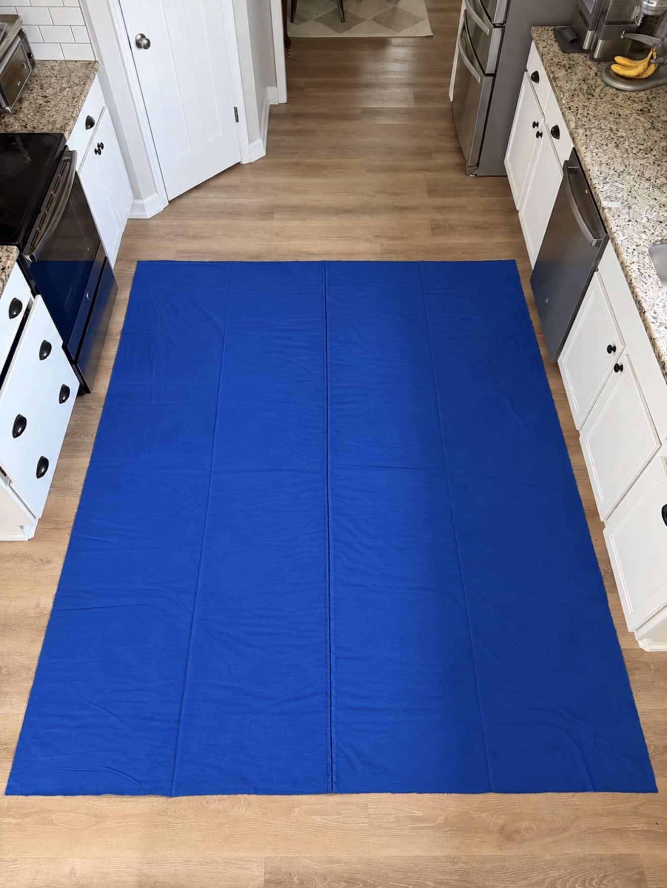 Blue flannel fabric on the floor.